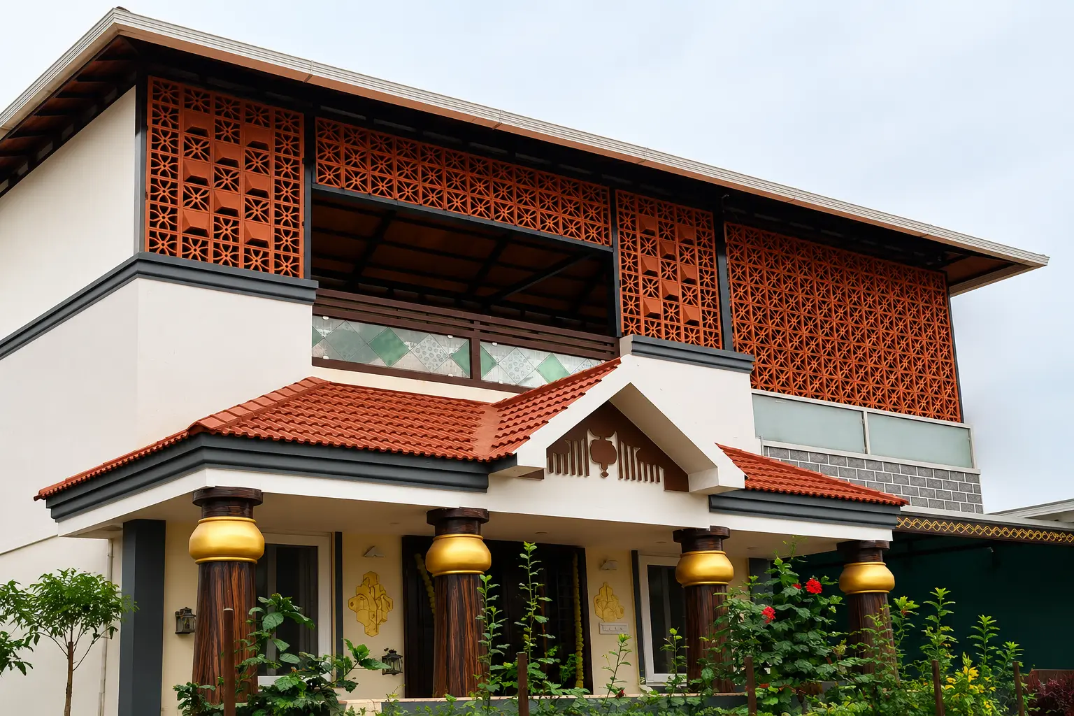 Comparison of clay, terracotta, concrete, and cool roof tiles for Kerala homes.